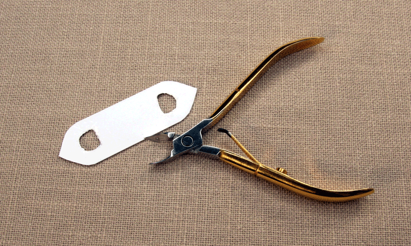 Making Holes in the DIY Tatting Shuttle