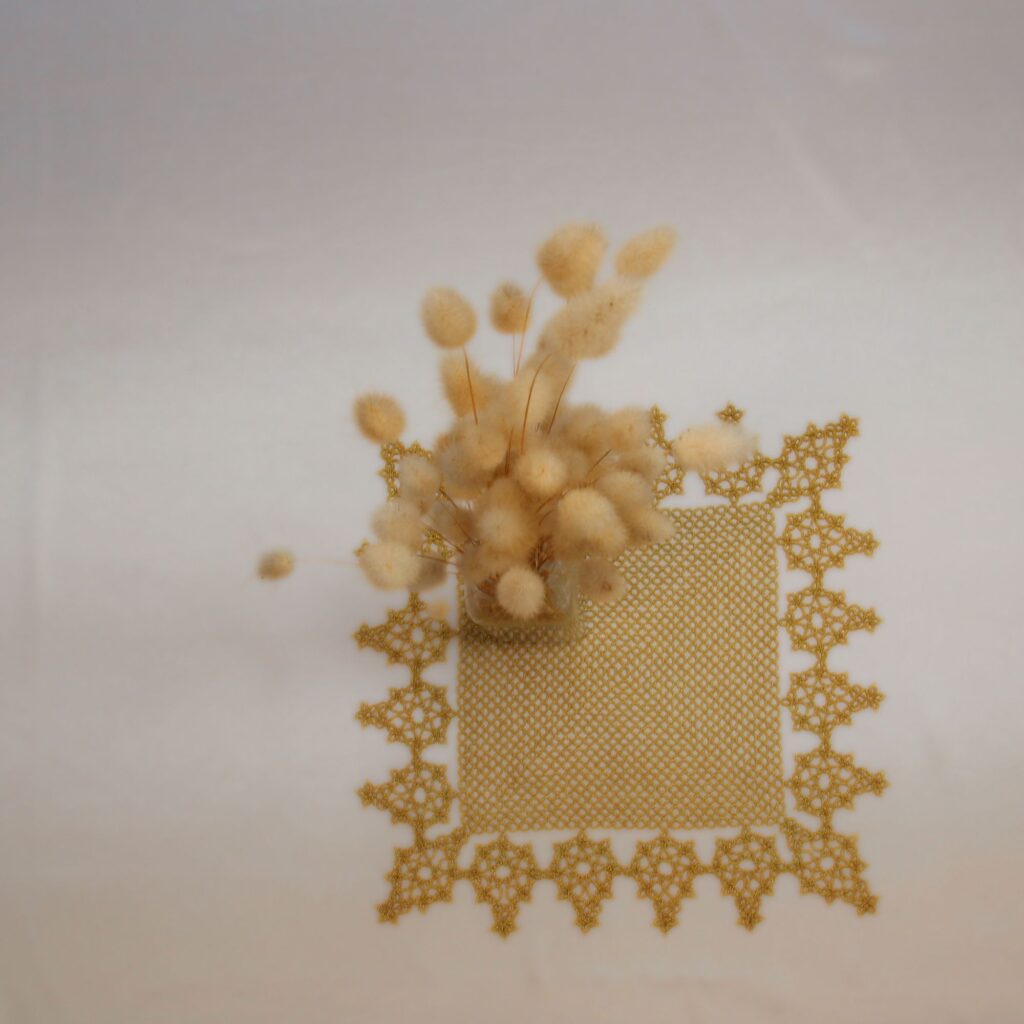 free tatting doily pattern gold square doily with small vase and decorative grass
